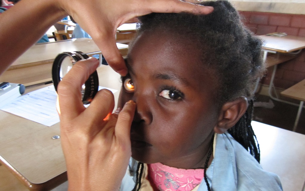 Girl's ocular testing in Mozambique