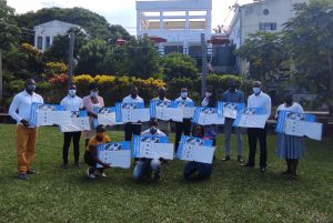 Group photo of the teachers attending the training with training material.