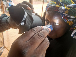 Eye examination of a woman in Mali