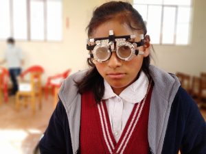 A girl wearing optical trial lens frame