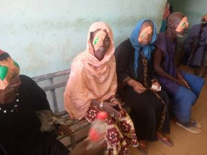 Group of women with a covered eye after the eye procedure