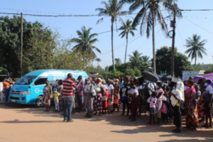 People attending eye health promotion talks in Mozambique.