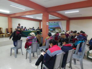 A group of people attending an eye health session in Oruro.