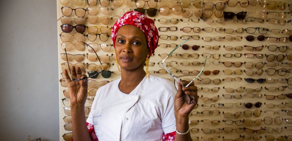 Woman with glasses in her hands